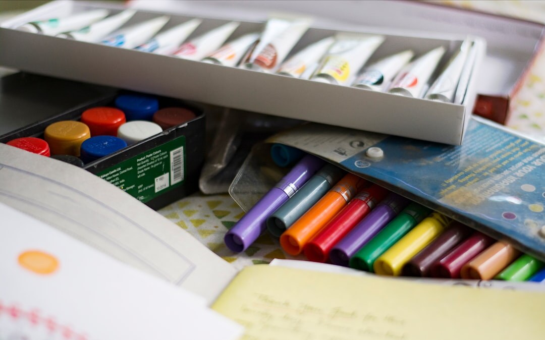 Colorful art supplies and sketchbooks